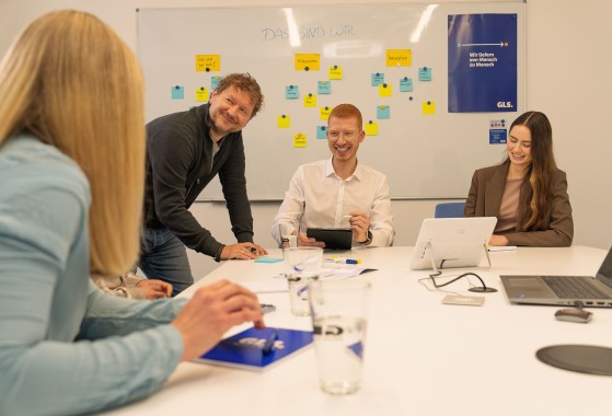 Employees in a meeting working together 