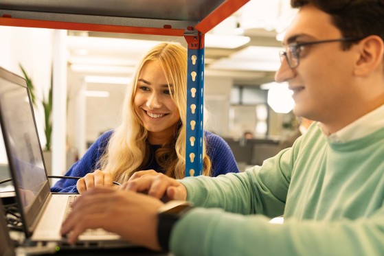 Interns working at the laptop