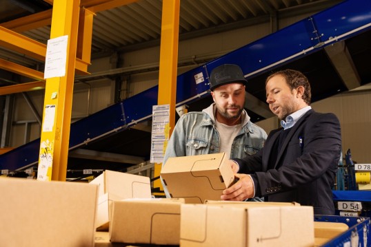 Managers in the Depot with parcels