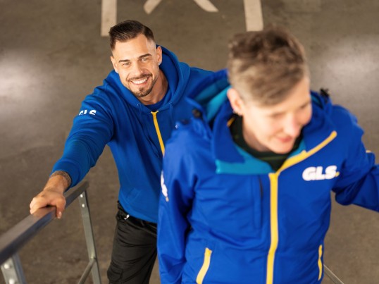 two Employees at stairs in the depot