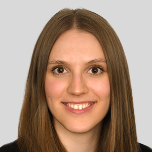 Portrait employee with long brown hair